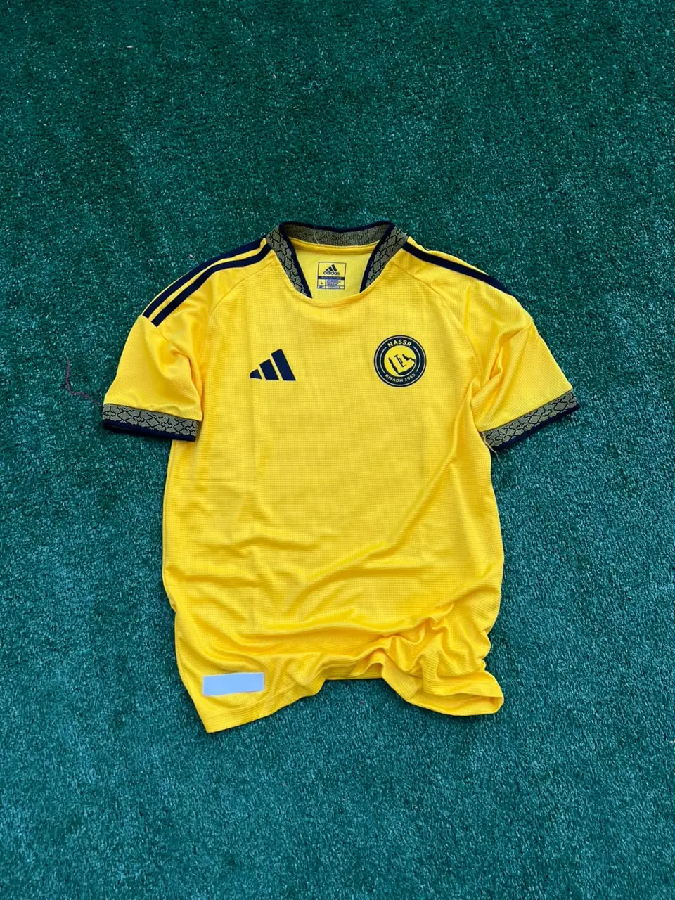 قميص النصر الأساسي 2026/27 بشعارات ثري دي TH-134